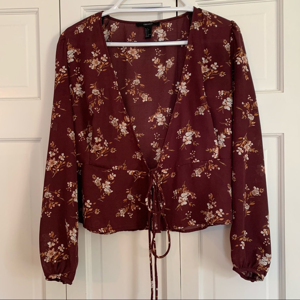 Forever 21 semi-sheer peplum blouse. Size: S